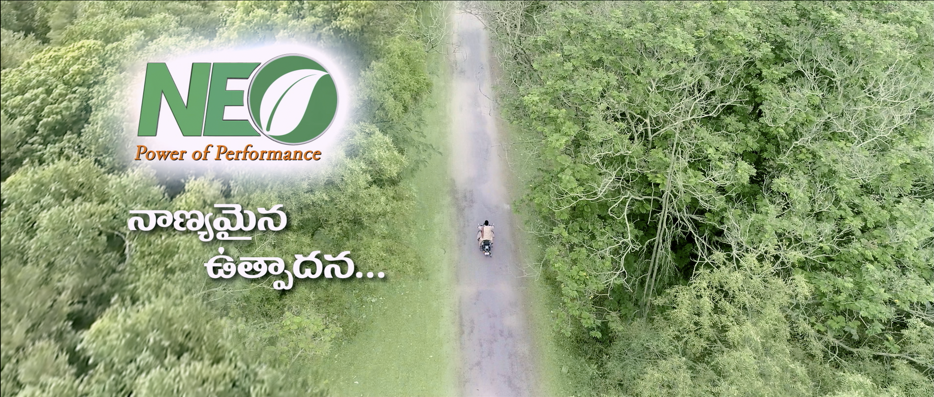 BVisuals-Ad film & video production showcasing a scenic drone shot with a rider on a road, highlighting the 'NEO - Power of Performance' branding.